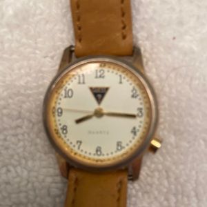 Guess watch with tan leather band.